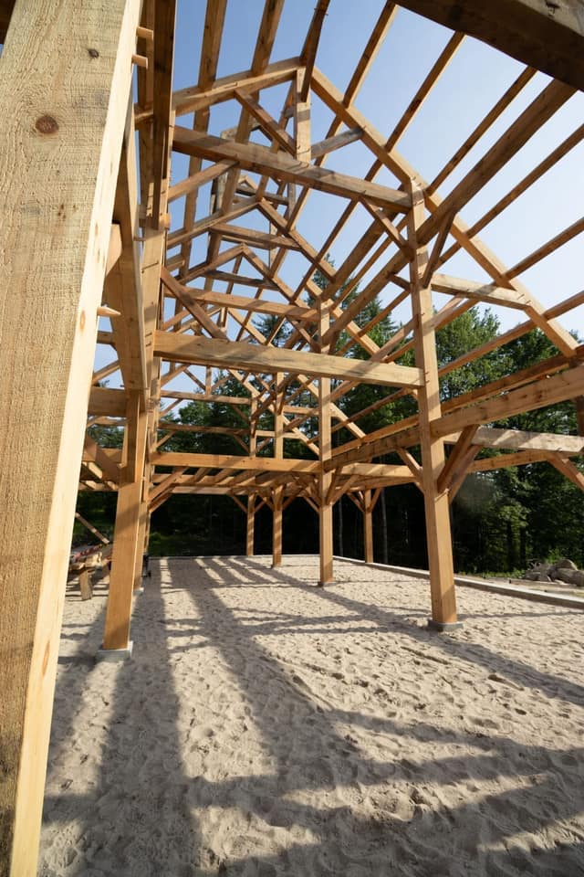 traditional timber frame barn rough sawn pine purlins wedding barn